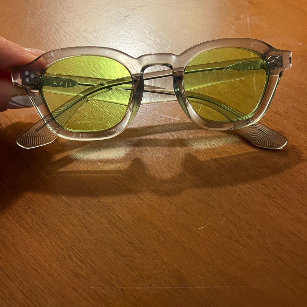 Clear Frame Sunglasses with Green Lenses